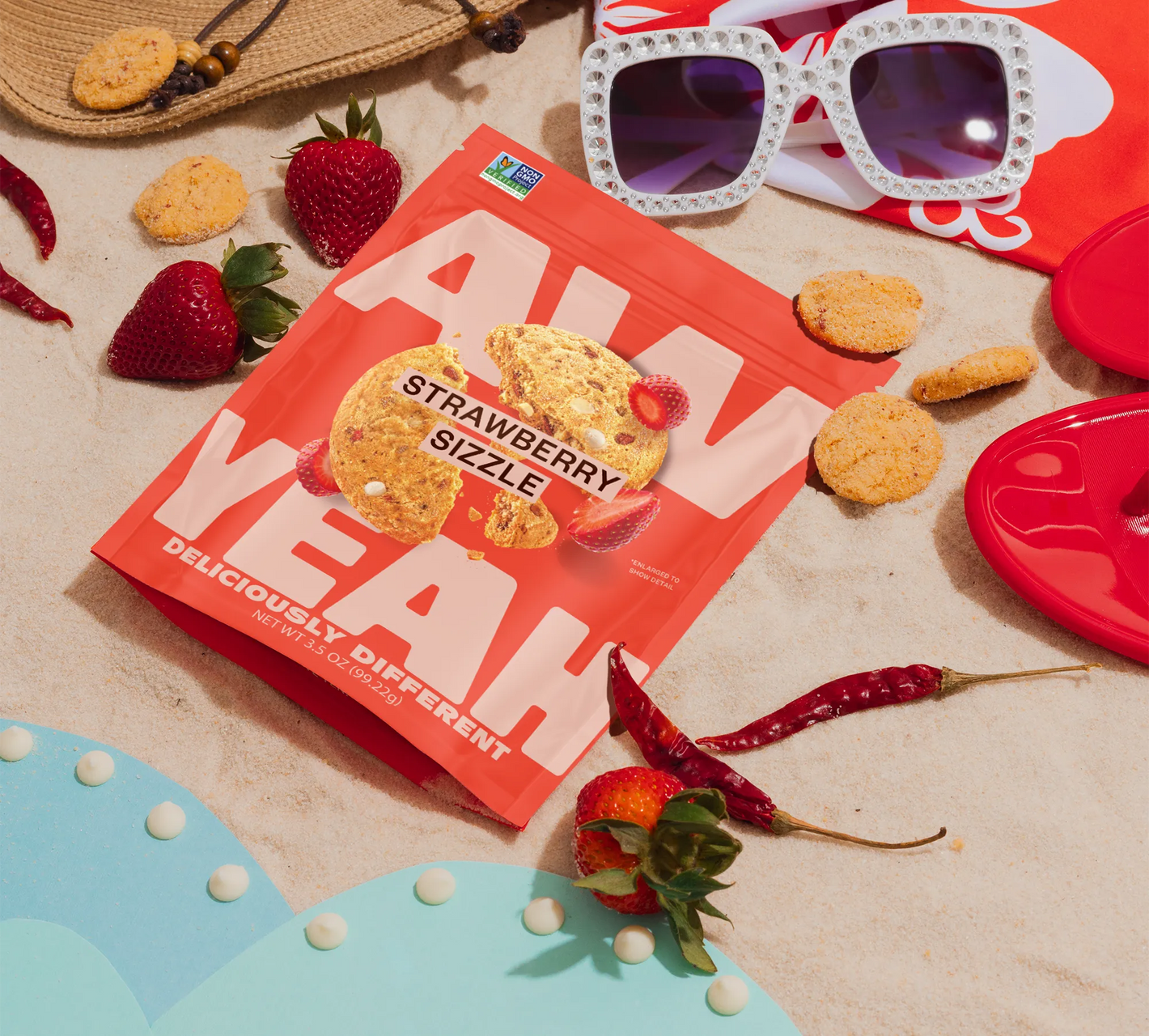 gluten free non gmo diary free sweet and spicy cookie-Aw Yeah package on the beach with cookies, strawberries and chilis